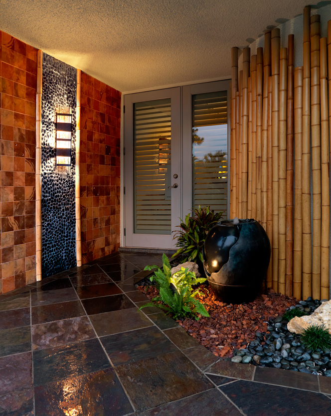 Dramatic Zen Entry with slate, bamboo, black rock, copper wall tile and ebony glazed fountain